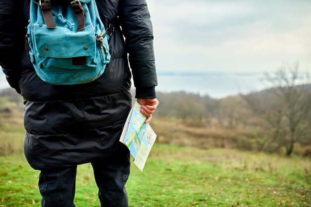A detailed shot of a national park permit hanging from a backpack, emphasizing its importance for accessing certain trails or areas. The permit should appear official and clearly displays park name and date.