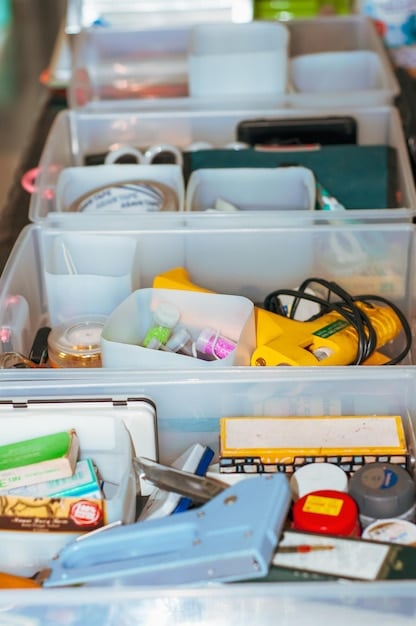 An interior shot of an RV showcasing a well-organized recycling system with clearly labeled bins for different types of recyclables. The image emphasizes the importance of waste management on the road.