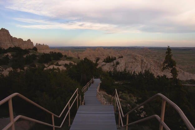 A panoramic vista of the Grand Staircase-Escalante National Monument, showcasing its vast and varied landscapes. The image captures the scale and beauty of the monument's canyons, mesas, and rock formations.