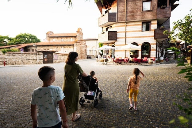 A lively street scene in Italy, with locals chatting and laughing. The atmosphere is warm and inviting, showcasing the everyday life of the community.