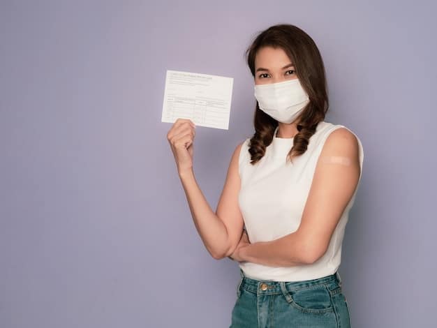 A photograph of a person holding a vaccination card and a negative COVID-19 test result while standing in an airport check-in line, illustrating the practical health documents required for international travel.