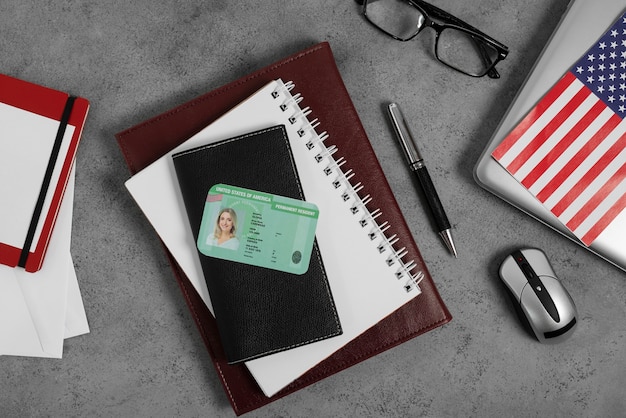 A clear photograph showing a US passport open to the photo page next to a Global Entry card, emphasizing the primary required documents for entry into the United States.