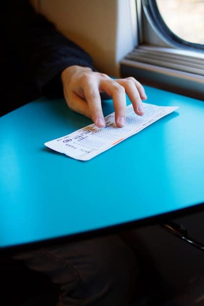 A close-up of an airline ticket displaying fare class information and a small icon indicating baggage allowance, with a confused hand pointing at the details.